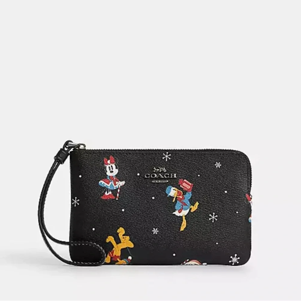 Disney X Coach Corner Zip Wristlet With Holiday Print
BESTSELLER